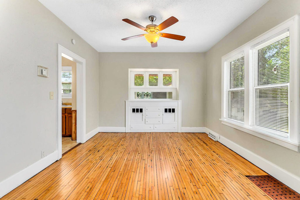 620 wood floor living room with built in cabinets