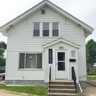 clean white house front at 814 8th street south