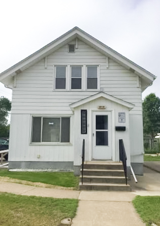 clean white house front at 814 8th street south